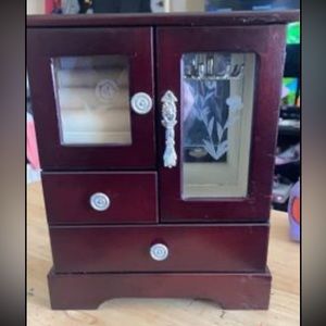Brands new jewelry box. Every thing still works perfectly on it. No scratches
